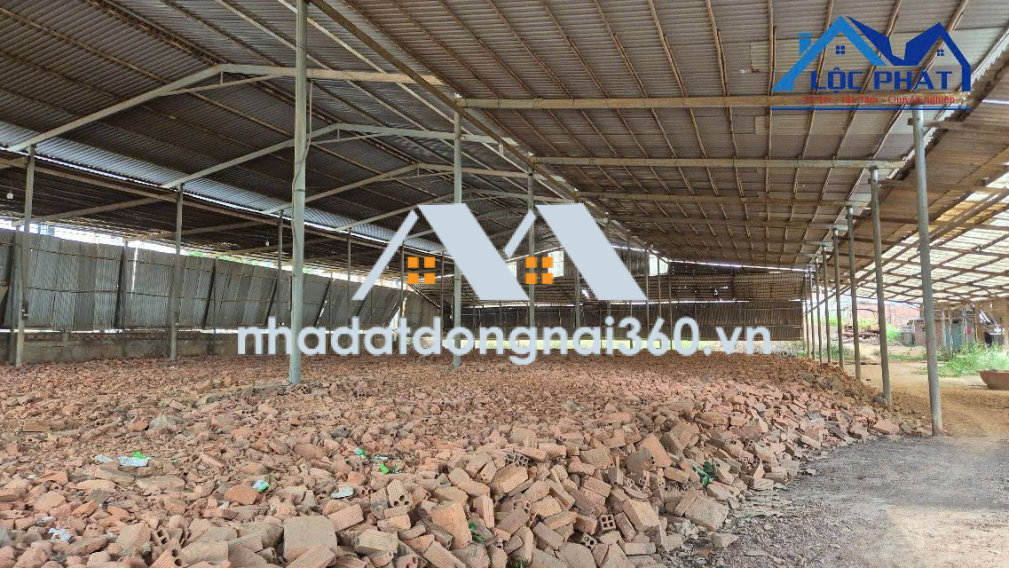Bán đất tặng nhà Xưởng tại Phường Long Hưng dt 4500m2 giá 63 tỷ