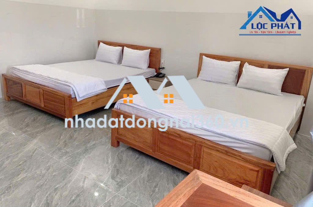 Bán cặp Khách Sạn đang kd tại Xuân Lộc Đồng Nai 9900m2 giá 200 tỷ